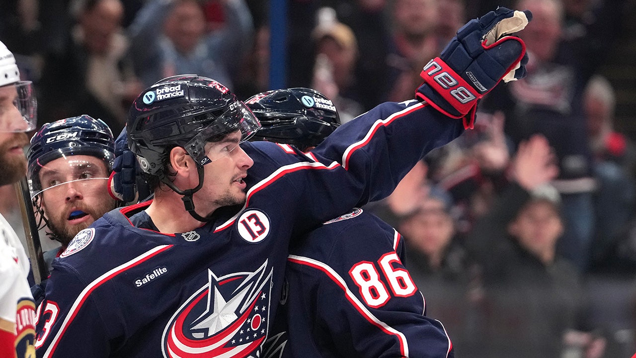 Johnny Gaudreau’s best friend on the Blue Jackets scores a goal and points to the late star’s name hanging in the rafters