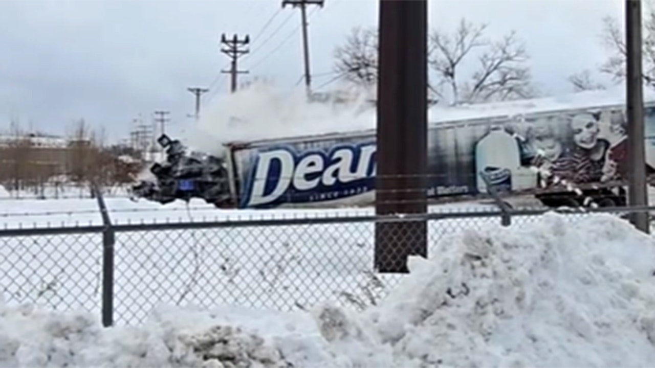 Pennsylvania train slams into milk truck, video shows