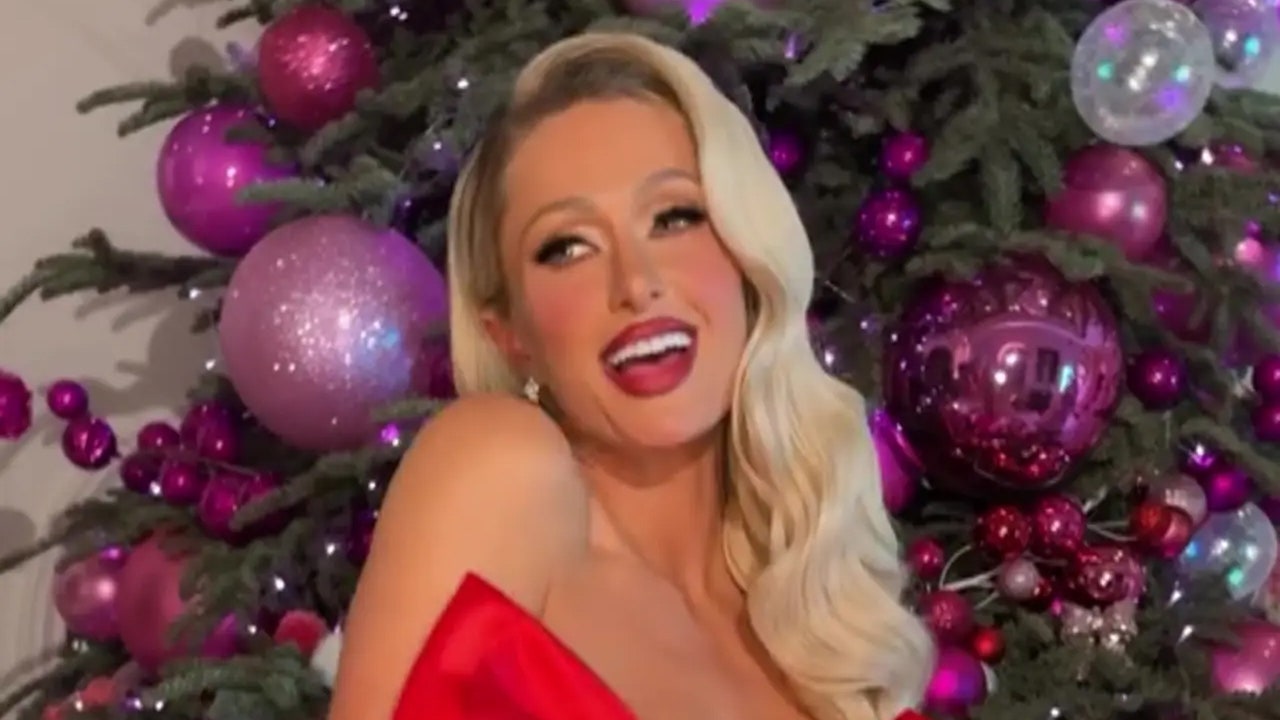 Paris Hilton strips down for racy Christmas photoshoot: ‘My presence is a present’