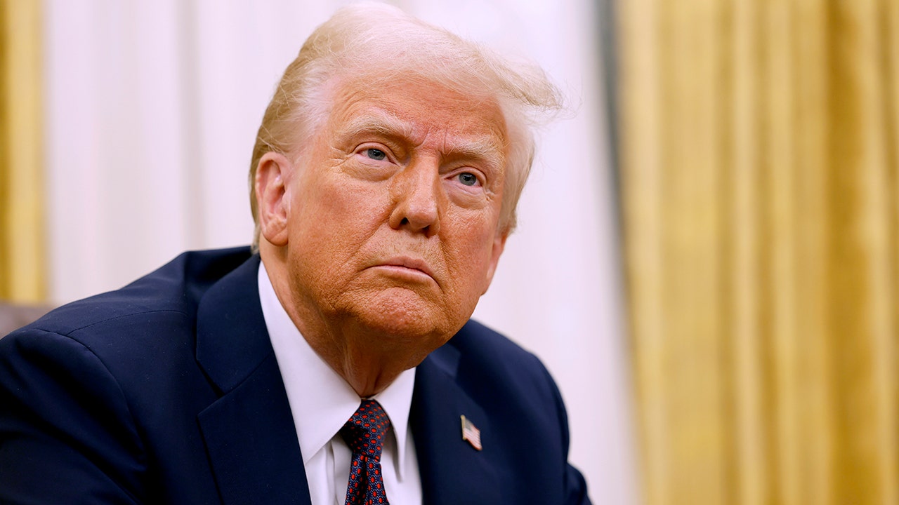 President Donald Trump speaks to reporters after signing a series of executive orders in the Oval Office of the White House on January 23, 2025, in Washington, D.C.