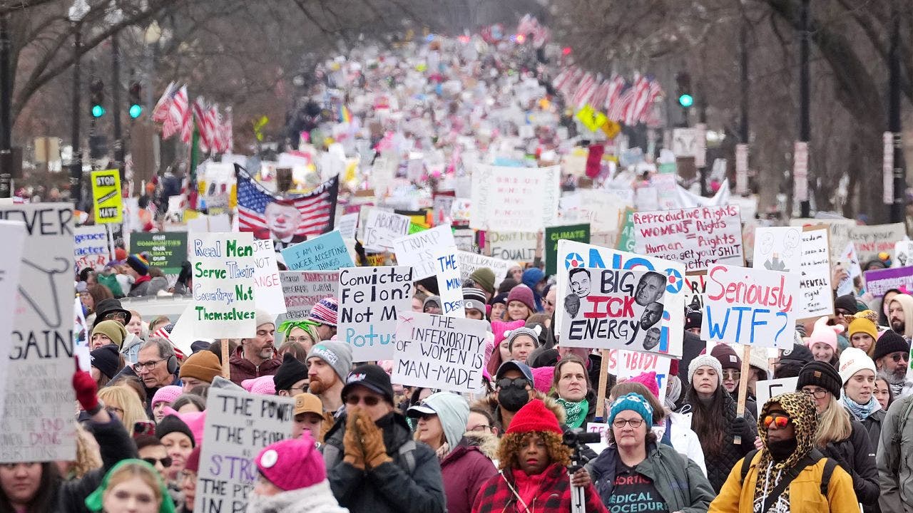 Thousands of demonstrators descend on Washington to protest Trump inauguration