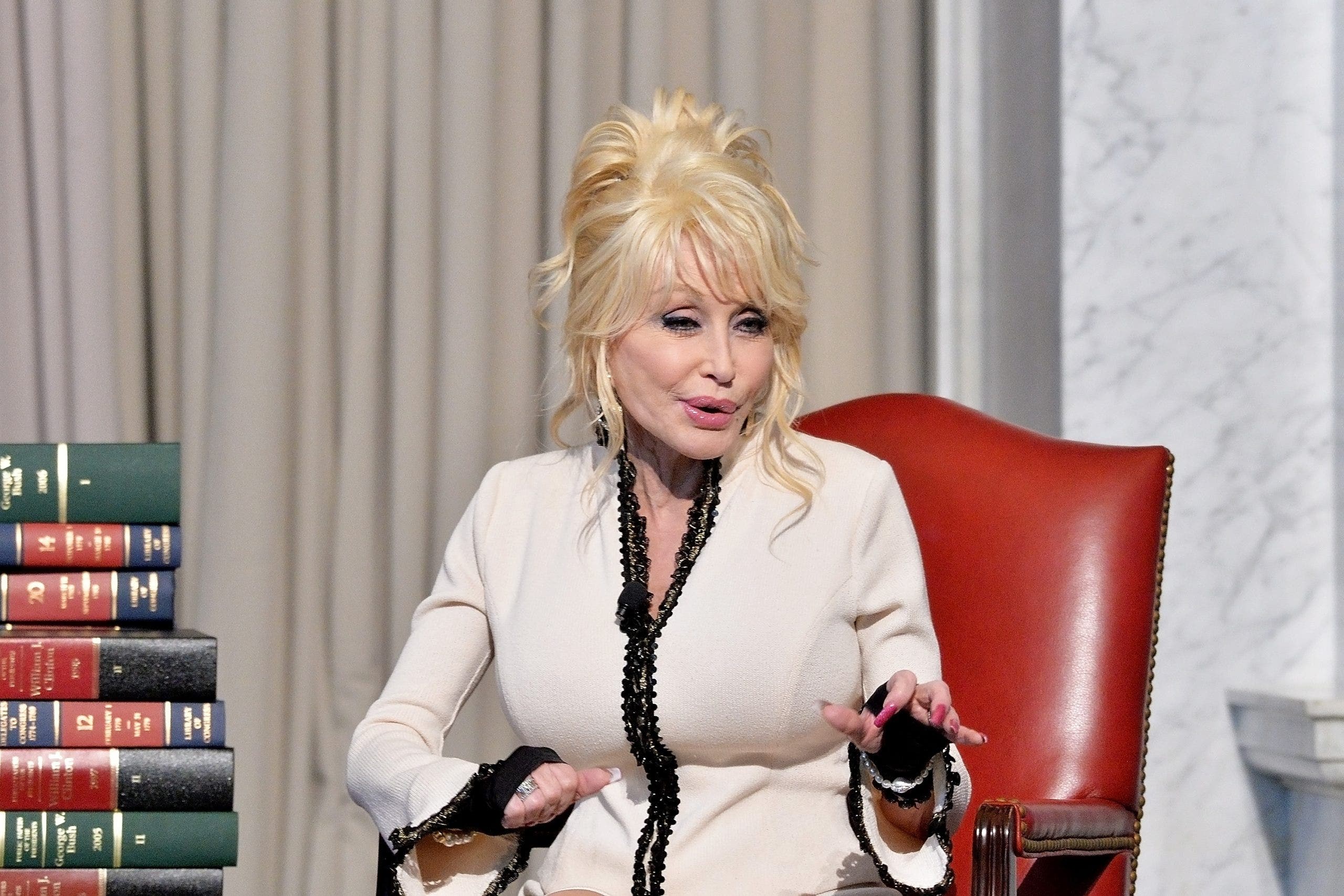 Dolly Parton urges the Indiana governor not to cut funding for her Imagination Library initiative, which benefits children. (Shannon Finney/Getty Images)