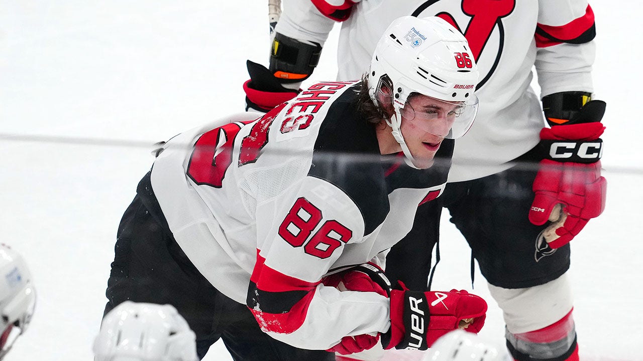 Devils star Jack Hughes out for season following hard crash into boards