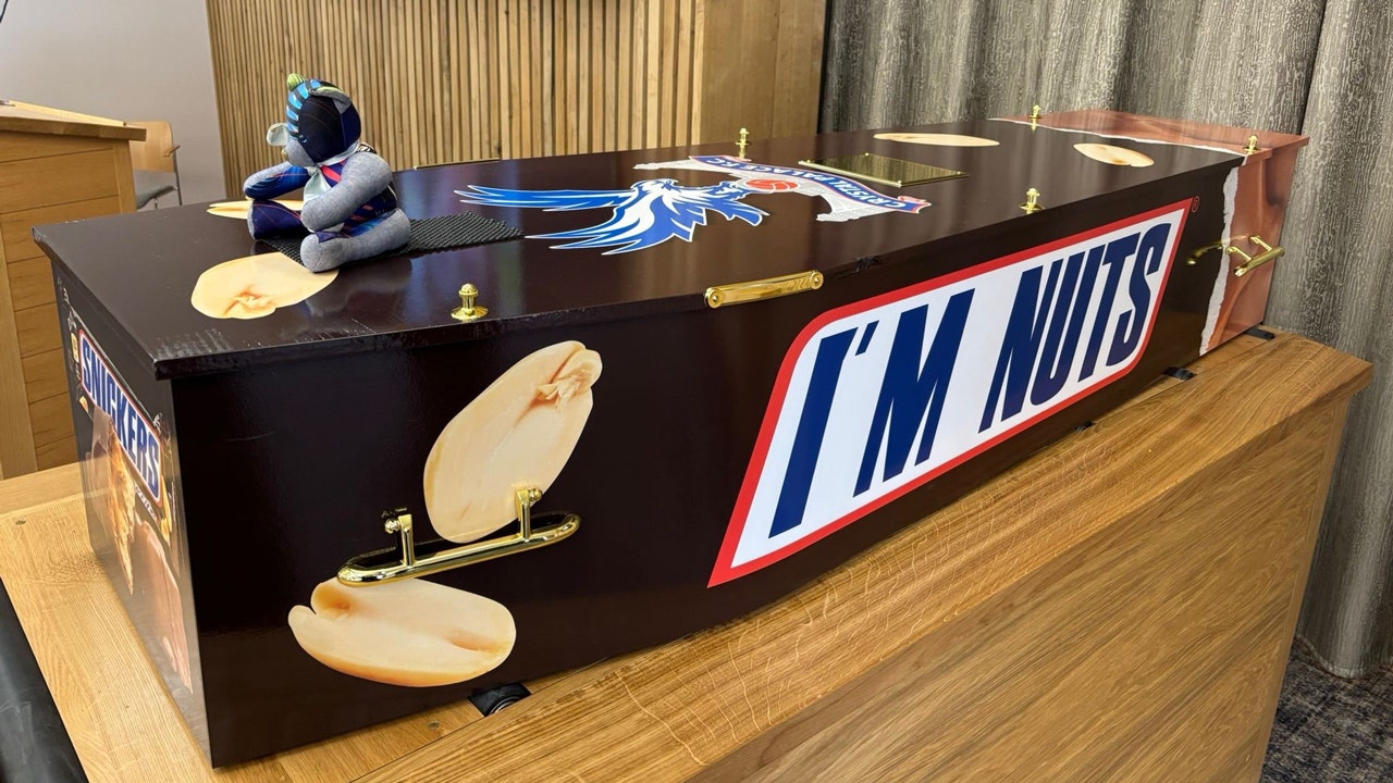 Man's Unique Farewell in Snickers-Themed Coffin Impresses Mourners