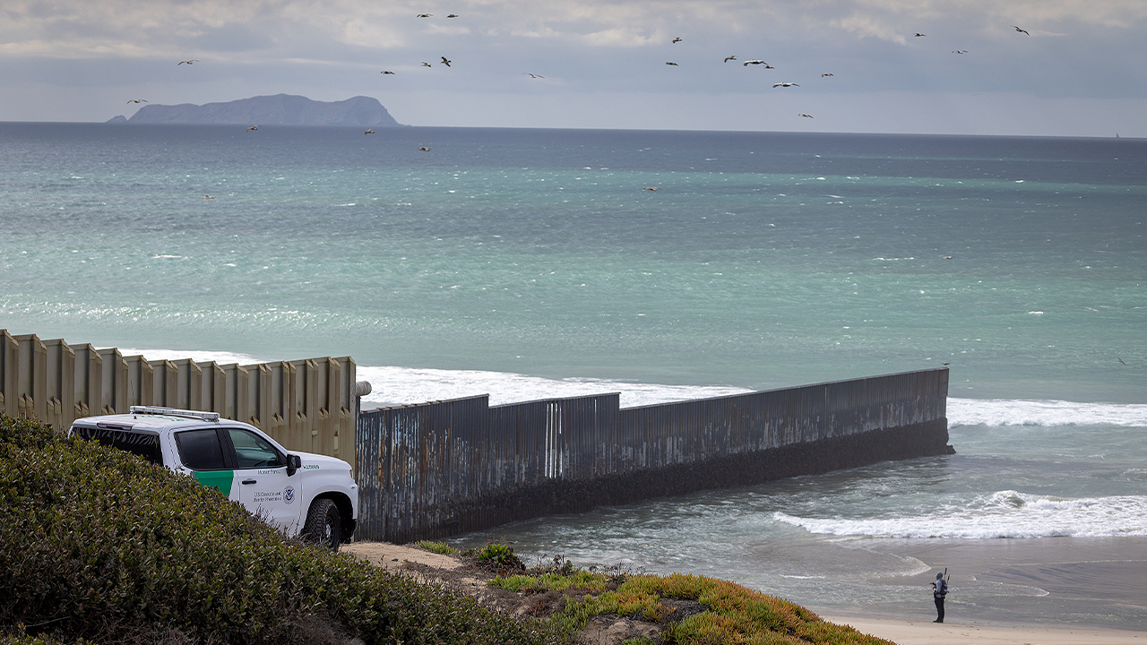 A U.S. Customs and Border Protection officer patrols in a truck along the U.S.-Mexico border wall in Imperial Beach, San Diego Saturday, Jan. 25, 2025. (Allen J. Schaben / Los Angeles Times via Getty Images) (Getty Images)