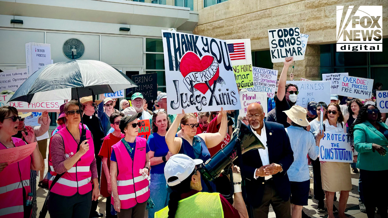Demonstrators gather outside the U.S. District Court in Greenbelt, Md., to protest the continued detention of Kilmar Abrego Garcia, a migrant and alleged MS-13 member who was deported to El Salvador in March, in what Trump administration officials have acknowledged was an 