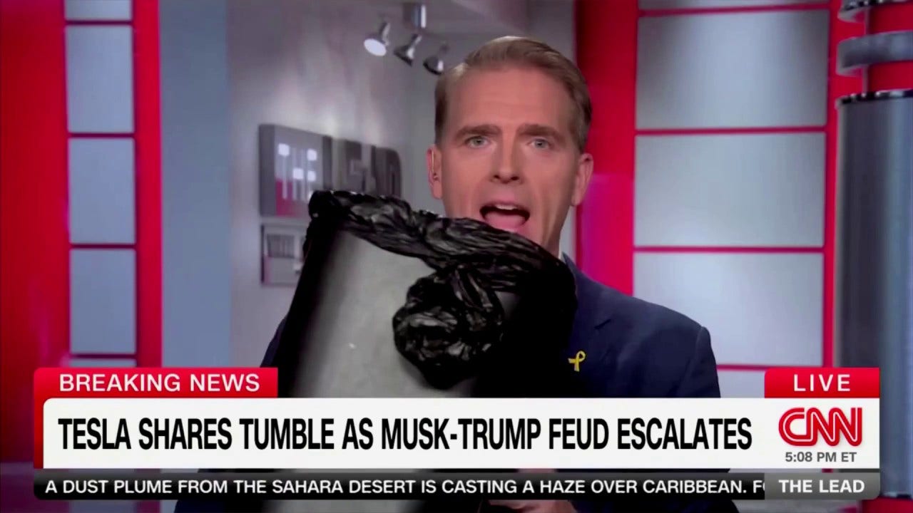 Scott Jennings puts head in trash bin to show how Republicans feel about Trump-Musk feud