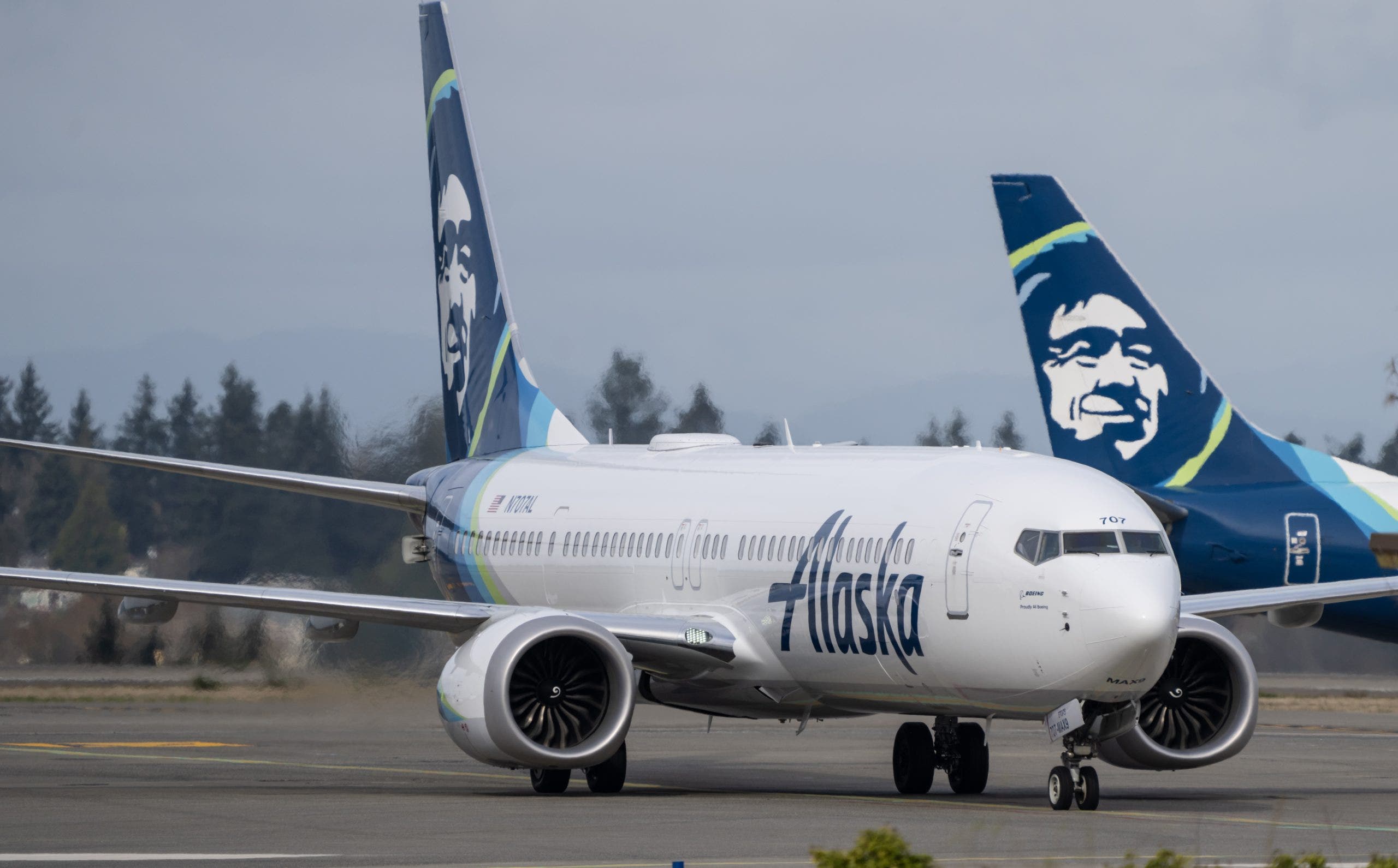 Passenger in custody after ‘direct threat’ to airplane shuts down Seattle Airport runways