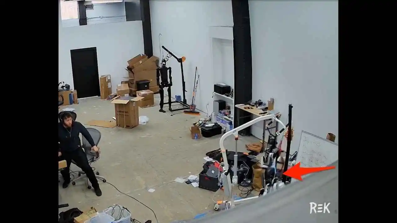 Screenshot from a video showing a Unitree H1 humanoid robot flailing violently during a test (CIX/X)