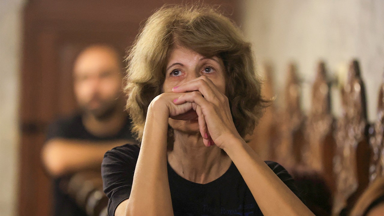 A woman looks on as mourners attend the funeral of Palestinian Christians who were killed in an Israeli strike on the Holy Family Church, according to medics, at the Greek Orthodox Saint Porphyrius Church, in Gaza City, July 17, 2025. (REUTERS/Dawoud Abu Alkas)