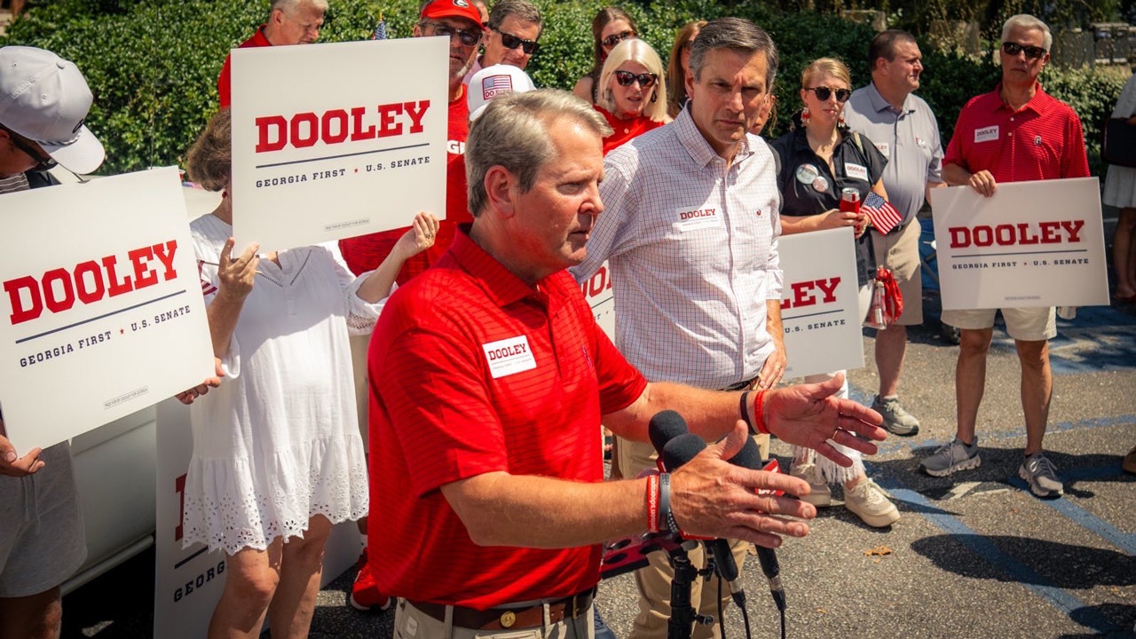 Gov Brian Kemp endorses former football coach Derek Dooley outside Georgia stadium for 2026 US Senate bid