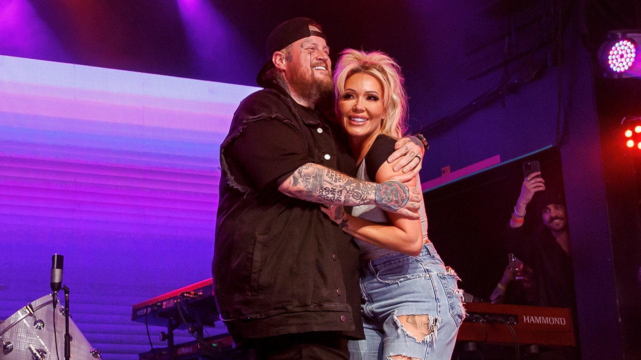 Jelly Roll’s wife body slams him in playful TikTok video after singer sheds 200 pounds