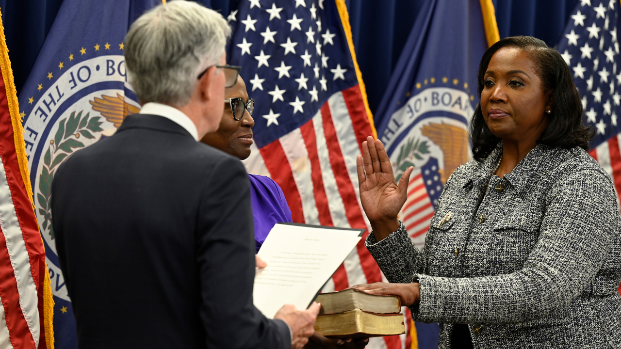 Federal Reserve Chairman Jerome Powell swearing in Lisa D. Cook as a member of the Board of Governors of the Federal Reserve System in May 2022. (U.S. Federal Reserve photo)