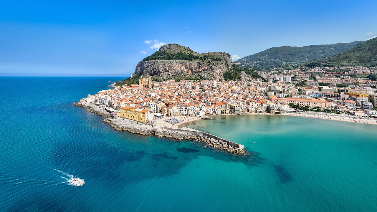 New bridge will link popular island to mainland as critics warn of mafia, earthquakes