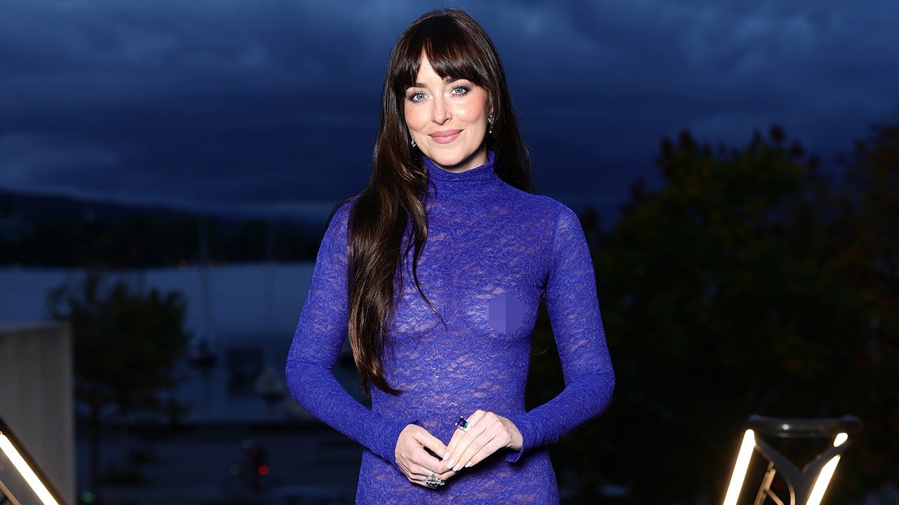 Dakota Johnson wears revealing Gucci gown at Zurich Film Festival