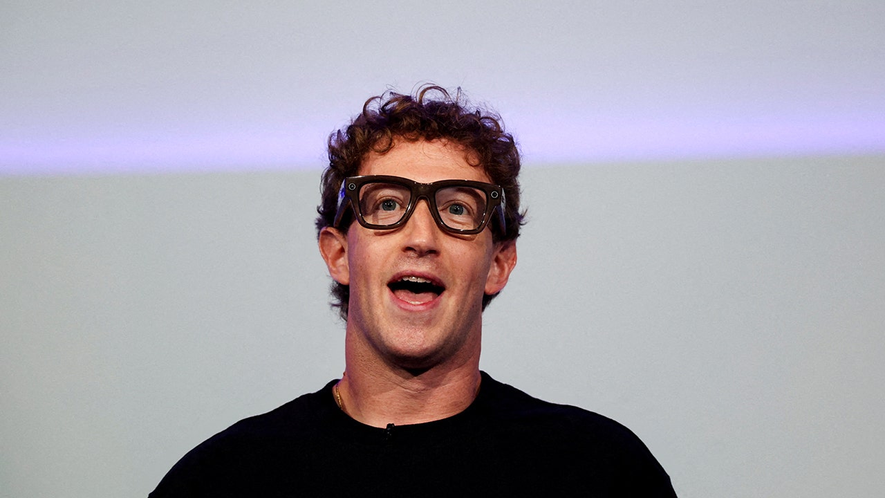 Meta CEO Mark Zuckerberg wears the Meta Ray-Ban Display glasses, as he delivers a speech presenting the new line of smart glasses, during the Meta Connect event at the company's headquarters in Menlo Park, California, U.S., September 17, 2025. (REUTERS/Carlos Barria)