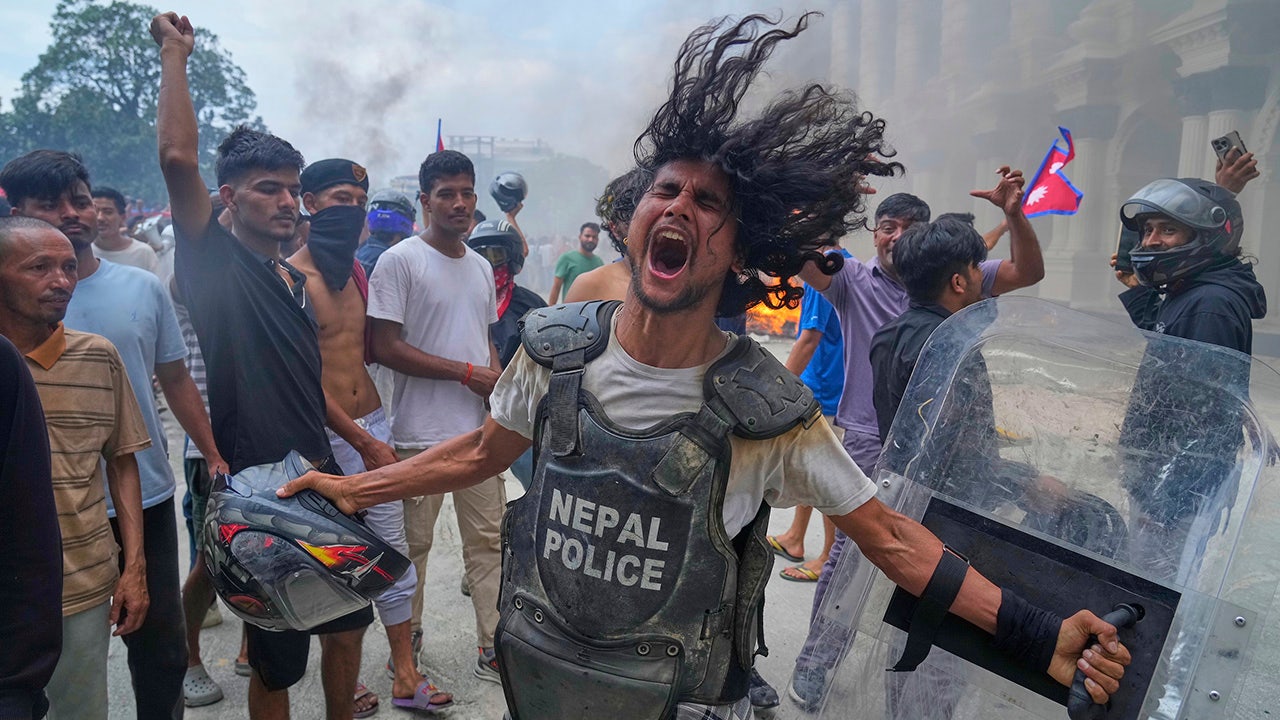 Violent Gen Z protests spiral with at least 19 killed in Nepal as video shows parliament building ablaze