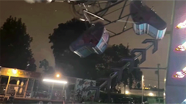 Carnival ride passengers left dangling in carriage after malfunction at high school event: video