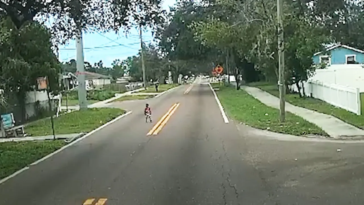 Bus driver hailed as hero for saving young child wandering alone on busy street