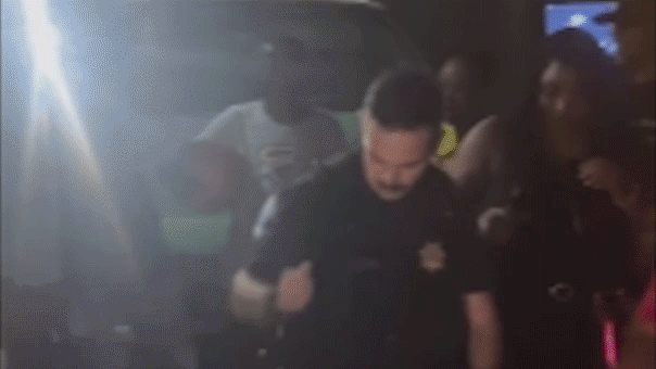 Officer's smooth dance moves convince partygoers to turn down music