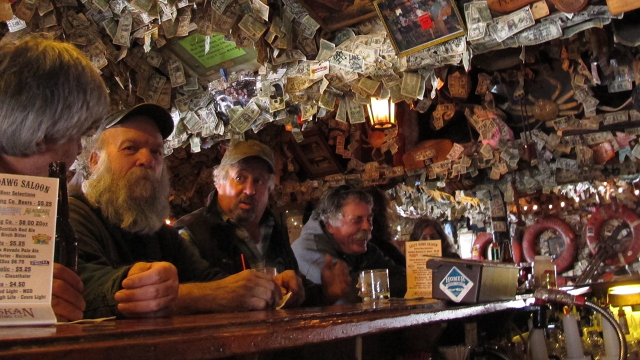 The ceiling in the Salty Dawg Saloon is covered with dollar bills. (Tara Bahrampour/The Washington Post)