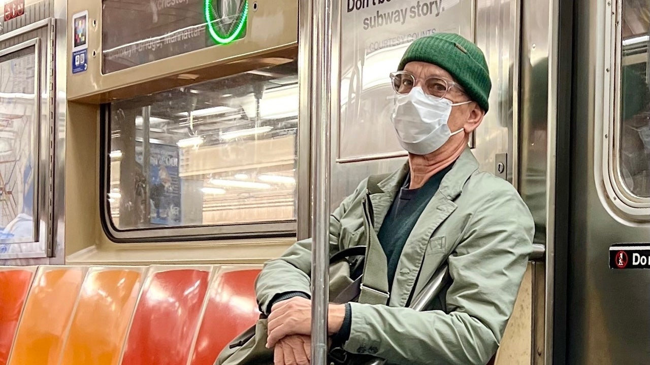 Tom Hanks spotted riding NYC subway with mask and beanie hat incognito