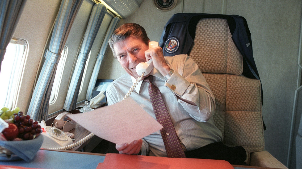 Former President Ronald Reagan is shown aboard Air Force One. (Ronald Reagan Presidential Foundation & Institute)