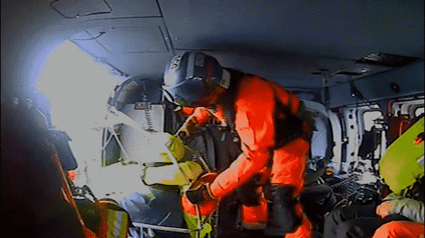 Coast Guard swoops in to save stranded sailors from sinking boat hundreds of miles off coast Coast Guard swoops in to save stranded sailors from sinking boat hundreds of miles off coast