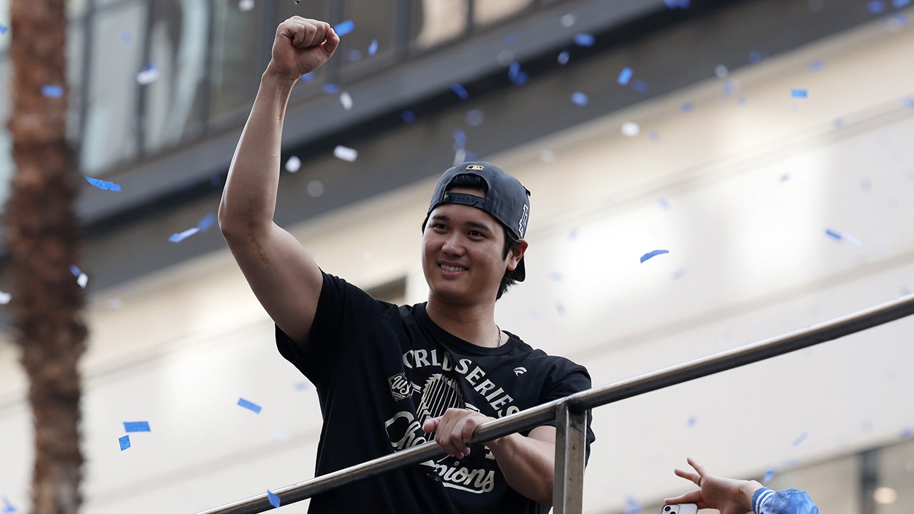 Los Angeles Dodgers two-way player Shohei Ohtani acknowledges the crowd during the World Series championship parade at downtown Los Angeles on Nov. 3, 2025 in Los Angeles, California. (Kiyoshi Mio/Imagn Images)
