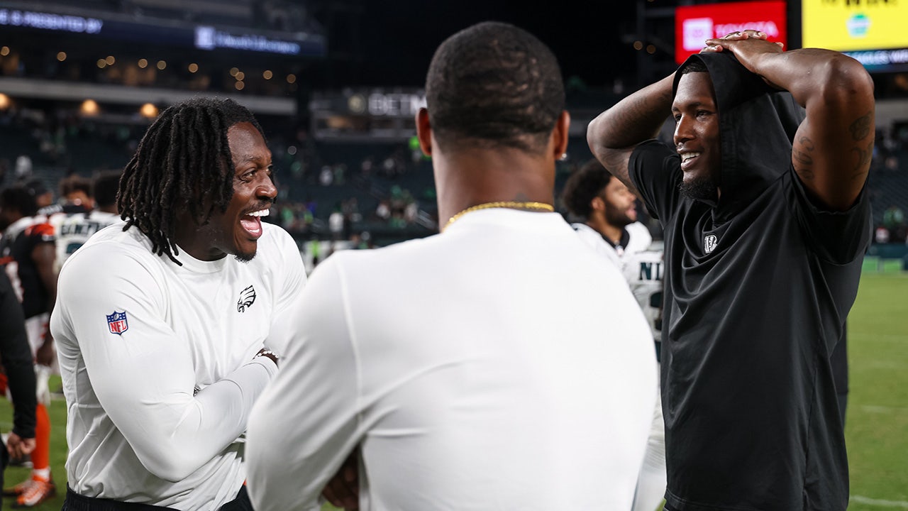 Tee Higgins (5) of the Cincinnati Bengals interacts with A.J. Brown (11) of the Philadelphia Eagles after an NFL Preseason 2025 game at Lincoln Financial Field on Aug. 7, 2025 in Philadelphia, Pennsylvania. (Scott Taetsch/Getty Images)