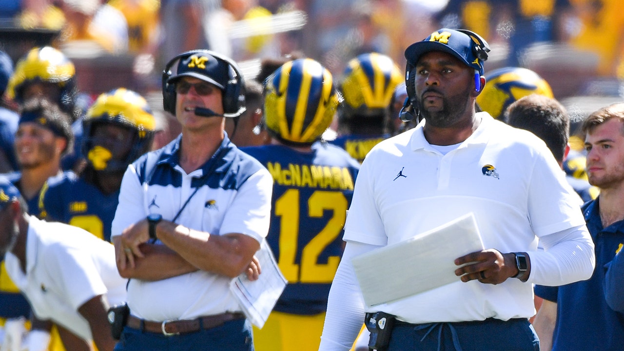 Head Football Coach Jim Harbaugh (L), Offensive Coordinator / Assistant Football Coach Sherrone Moore (C), and Assistant Football Coach Mimi Bolden-Morris (R) of the Michigan Wolverines are seen on the sideline during a college football game against the Colorado State Rams at Michigan Stadium on Sept. 3, 2022 in Ann Arbor, Michigan. (Aaron J. Thornton/Getty Images)