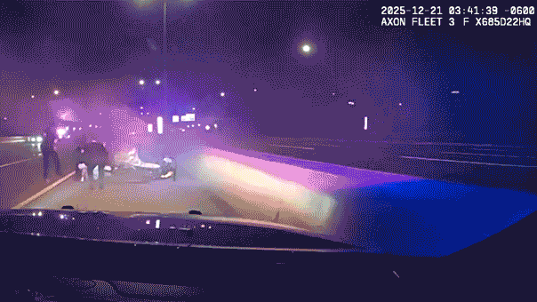 Illinois officers crawl under burning car to save trapped driver in dramatic Interstate 88 rescue