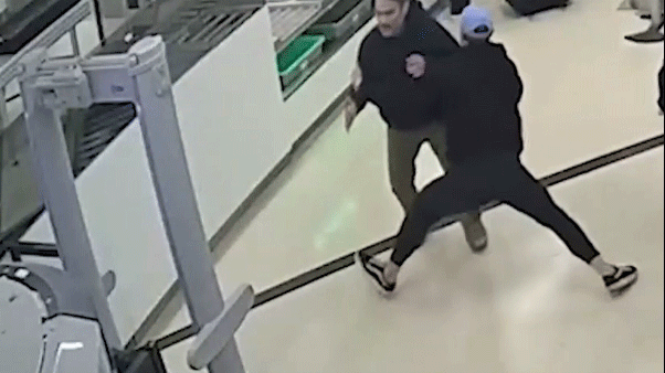 Video shows airport bystander bodyslamming TSA breach suspect in split-second takedown