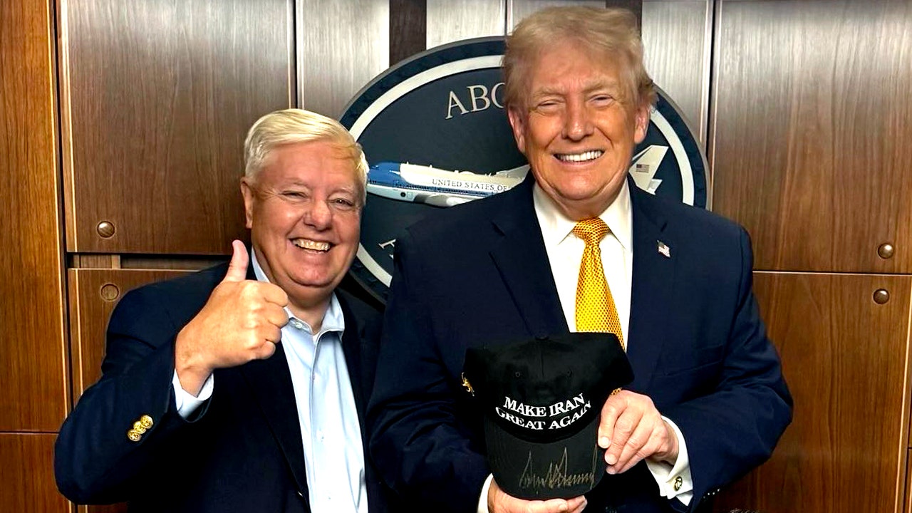 Trump Holds Signed Make Iran Great Again Hat With Sen Lindsey Graham 
