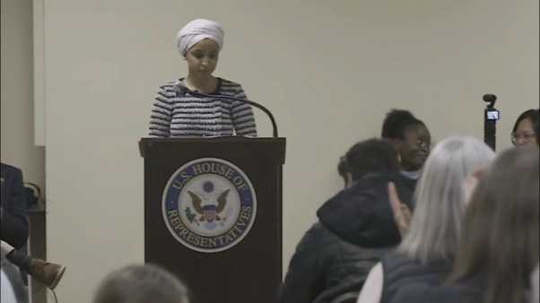 Ilhan Omar sprayed by unknown substance after man charges her at Minneapolis town hall