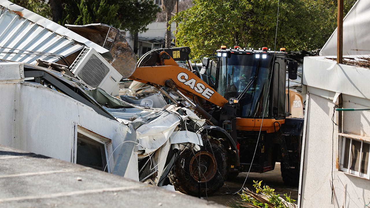 Heavy machinery operates as Israeli forces dismantle the Jerusalem headquarters of the United Nations Relief and Works Agency for Palestine Refugees (UNRWA), in East Jerusalem, Jan. 20, 2026. (Ammar Awad/Reuters)