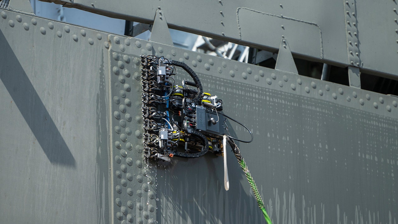 Swarms of wall-climbing robots will soon be crawling across U.S. Navy warships in a $71 million effort to slash repair delays and boost fleet readiness as China continues expanding its naval power. (Gecko Robotics)