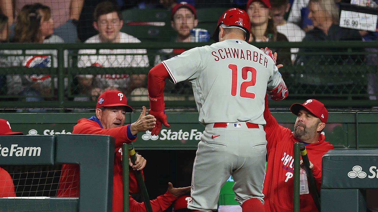 Phillies players scatter as rat runs along dugout during another loss, extending seven-game skid