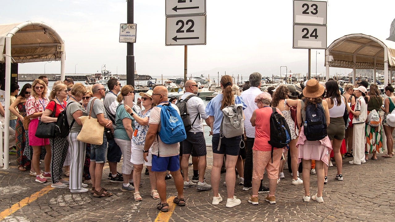 Stunning vacation hot spot turns into overcrowded nightmare as tourists flood streets