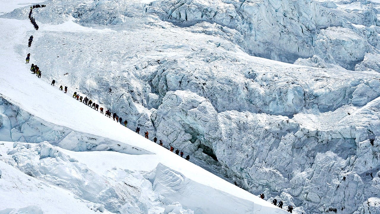 Record number of climbers summit Mount Everest from Nepali side despite overcrowding concerns Record number of climbers summit Mount Everest from Nepali side despite overcrowding concerns