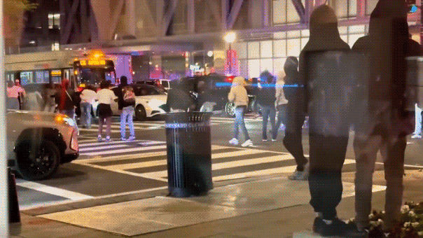 Teens tally  done  a engaged  intersection.