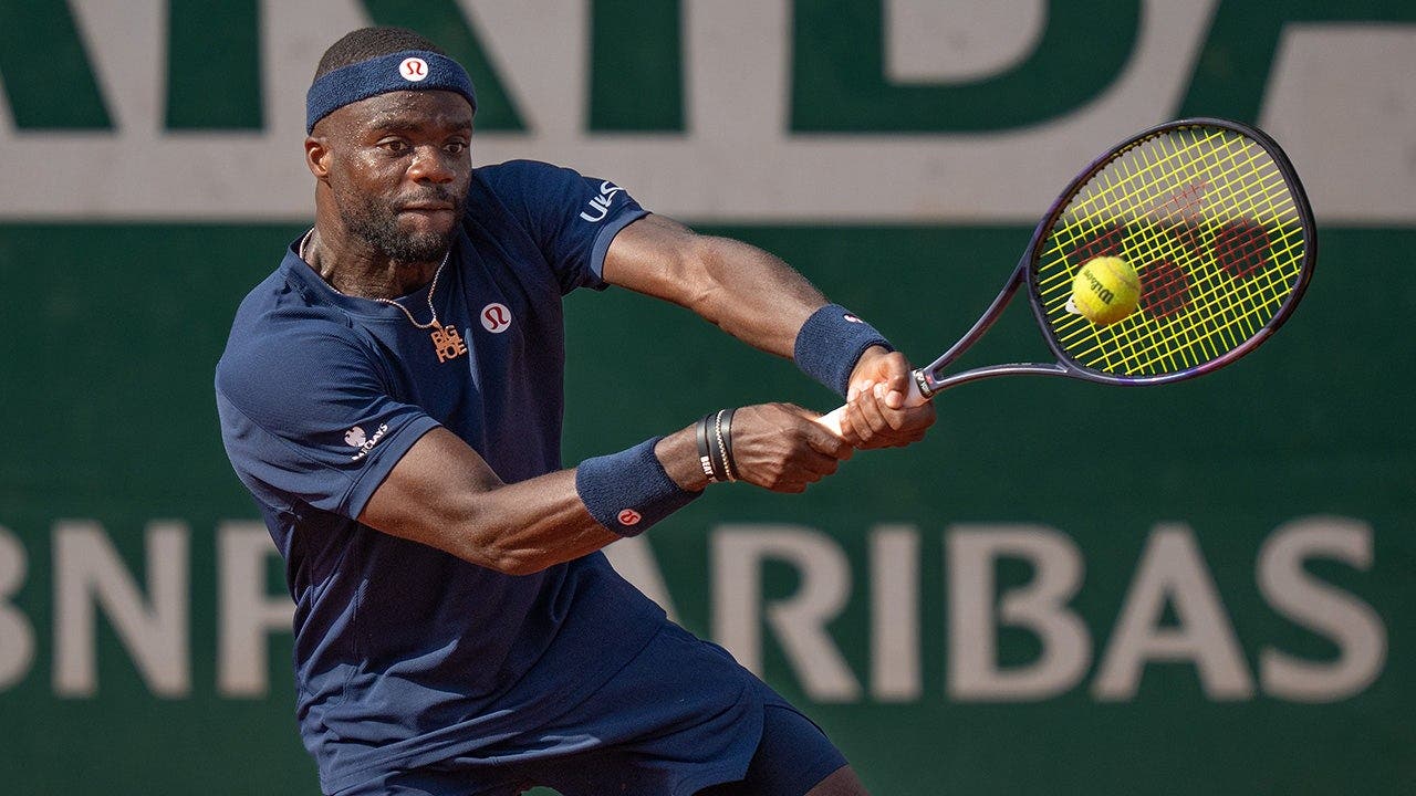 American Frances Tiafoe clashes with French Open opponent during comeback win