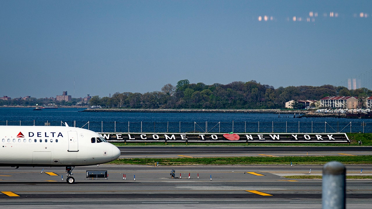 LaGuardia Airport AI hologram answers traveler questions