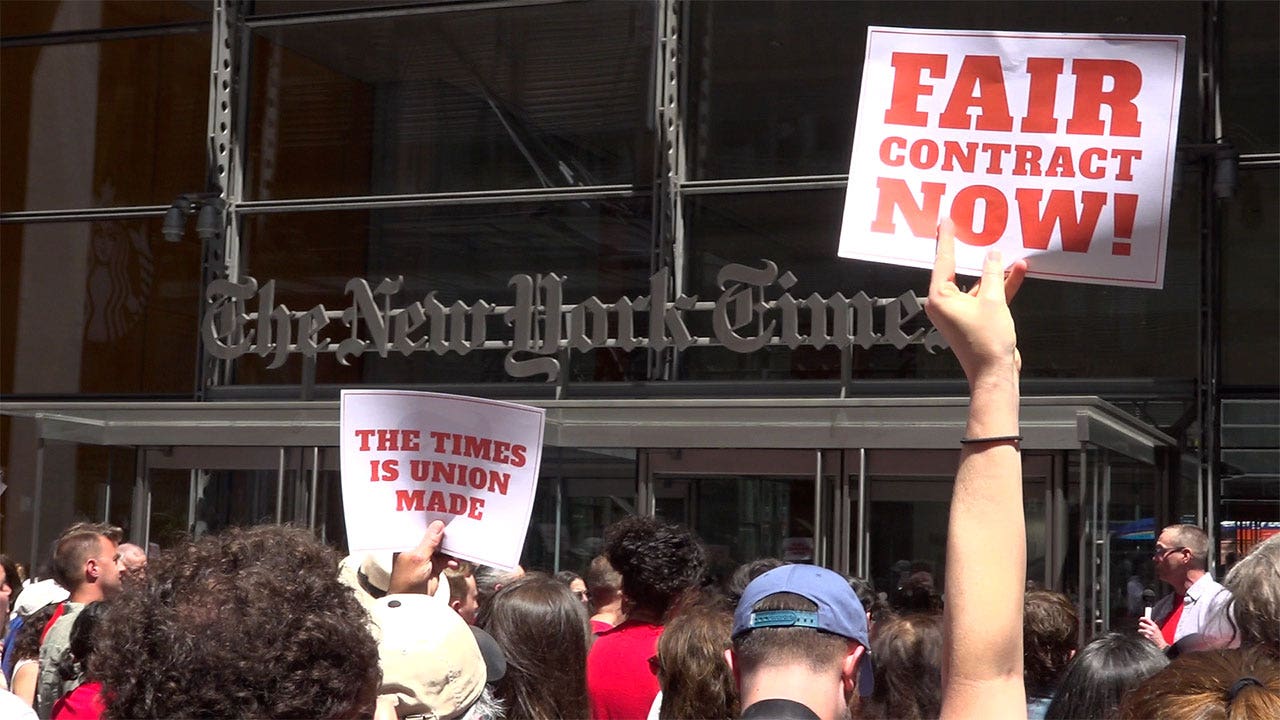 New York Times staffers rally outside headquarters demanding fair contract and AI protections New York Times staffers rally outside headquarters demanding fair contract and AI protections