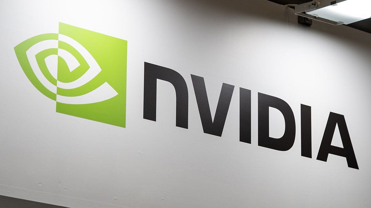 NVIDIA introduced Halos for Robotics, a full-stack safety system designed to help robots operate more safely alongside people in industrial workplaces. (Photo by Tomohiro Ohsumi/Getty Images)
