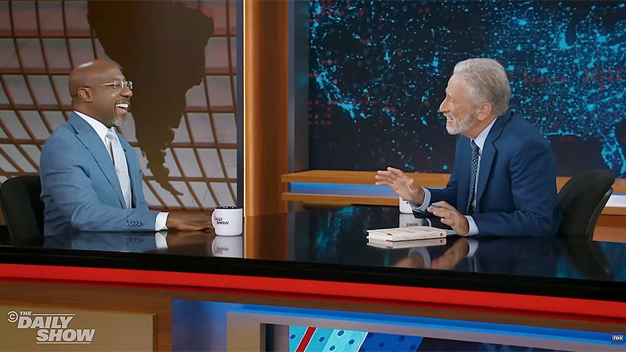 'I put up with politics': Sen Raphael Warnock confesses to Jon Stewart he is 'not in love' with the system