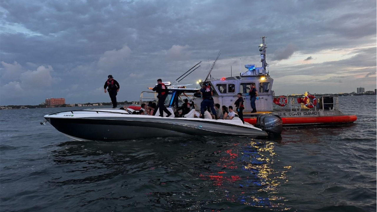 Coast Guard opens fire on boat smuggling 25 Chinese nationals near Florida after it refused to stop Coast Guard opens fire on boat smuggling 25 Chinese nationals near Florida after it refused to stop