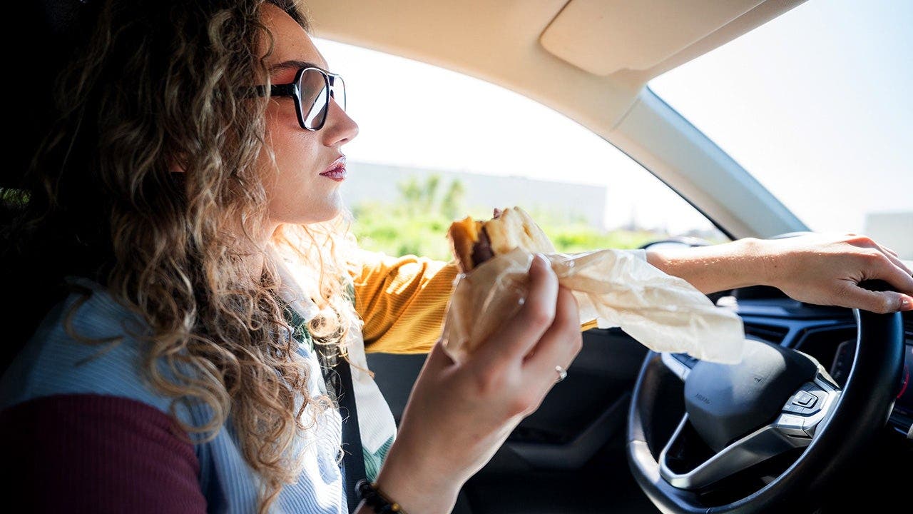 More Americans now eat in their cars than ever before as expert reveals what it says about modern life