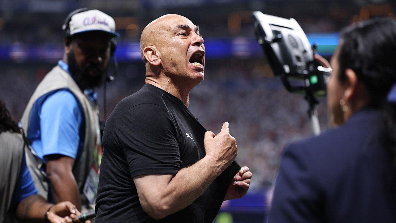 Egypt coach Hossam Hassan faces the fans with the Israeli flag at the World Cup Egypt coach Hossam Hassan faces the fans with the Israeli flag at the World Cup