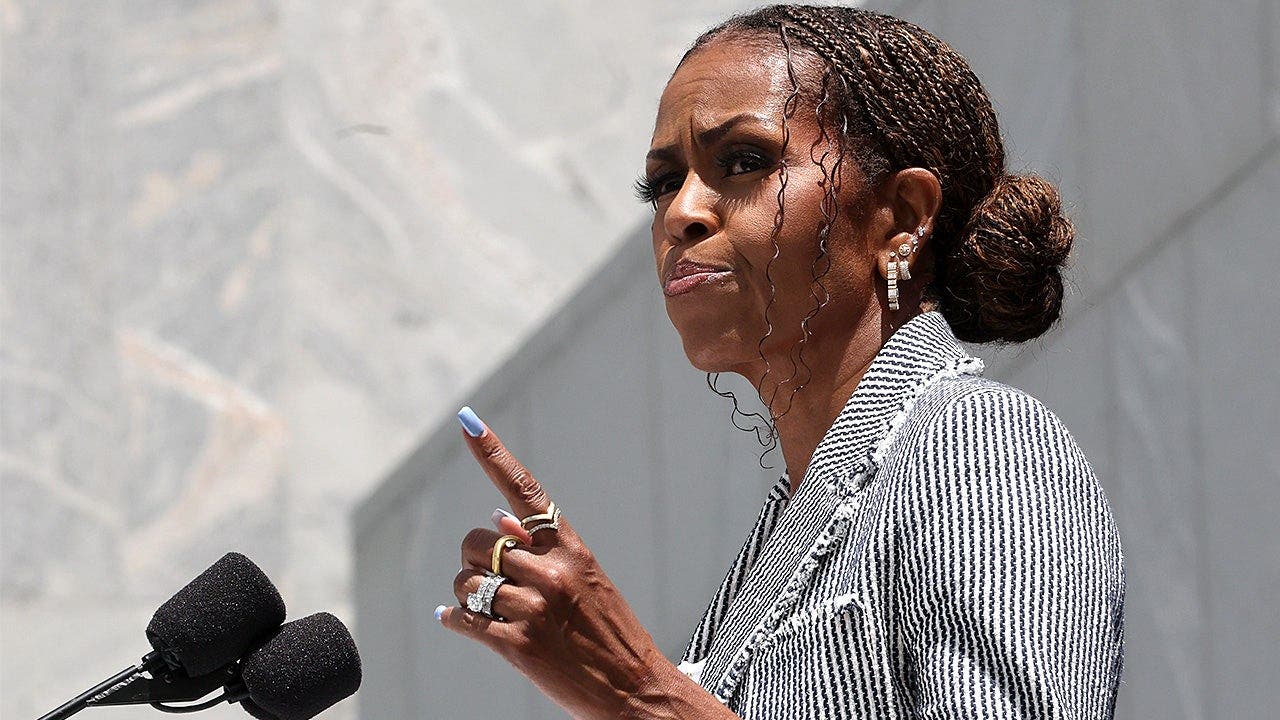 Michelle Obama says media used fashion to diminish her
